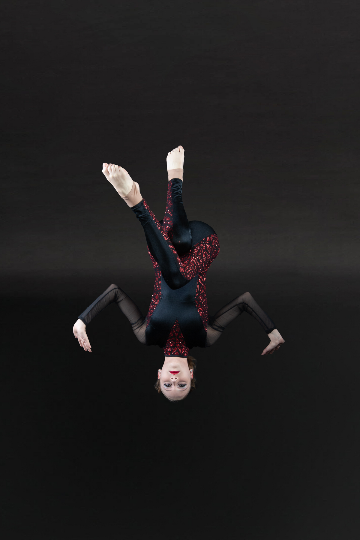 girl posing upside down